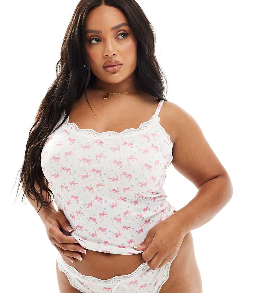 ASOS DESIGN Curve - Cassie - Set aus geripptem Camisole und Slip mit kleinem Schleifenmuster und Schleifenverzierung-Weiß von ASOS Curve