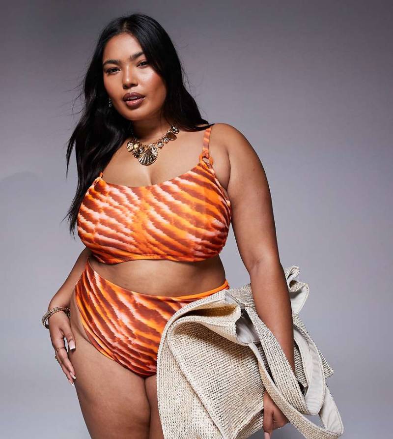 ASOS DESIGN Curve - Charlie - Bikinioberteil in Orange mit versteckten Bügeln und Animal-Print von ASOS Curve