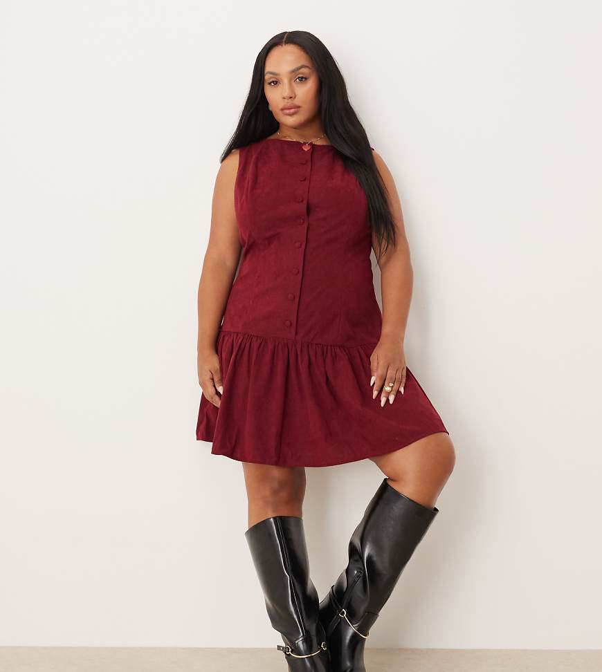 ASOS DESIGN Curve - Cord-Minikleid in tiefem Kirschrot mit tiefer Taille, U-Boot-Ausschnitt und Knopfleiste von ASOS Curve