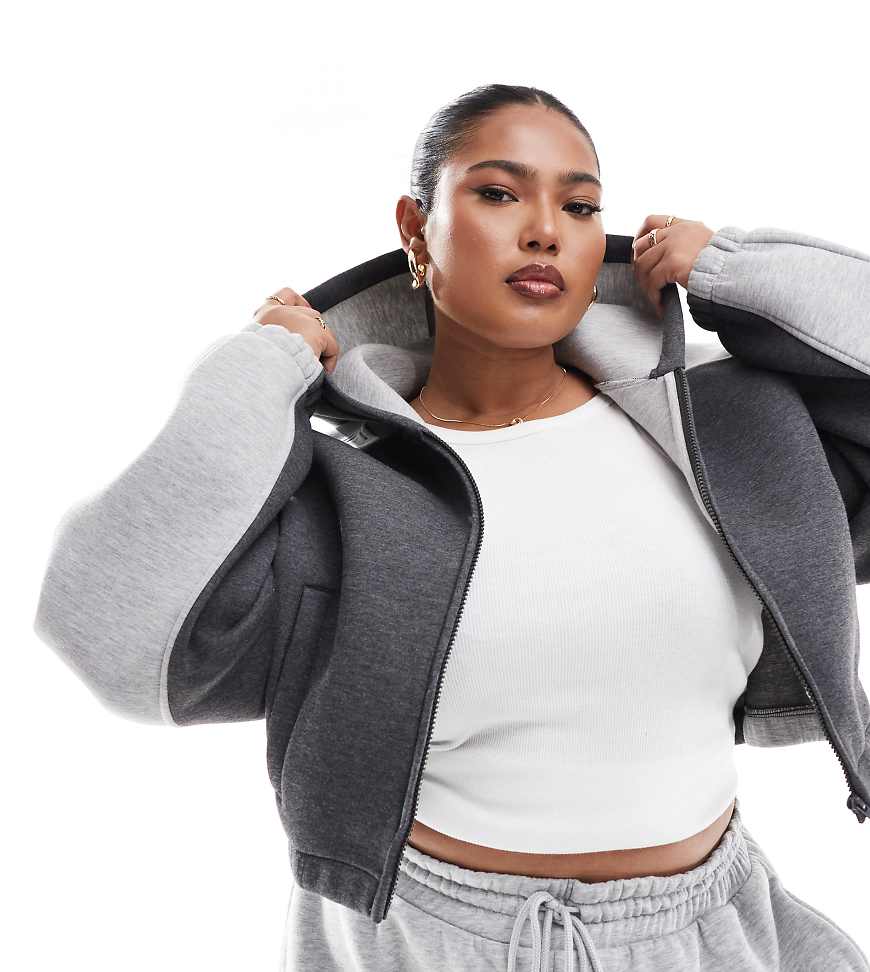 ASOS DESIGN Curve - Cropped Patchwork-Kapuzenpullover in Grau-Bunt ASOS DESIGN Curve - Cropped Patchwork-Kapuzenpullover in Grau-Bunt von ASOS Curve