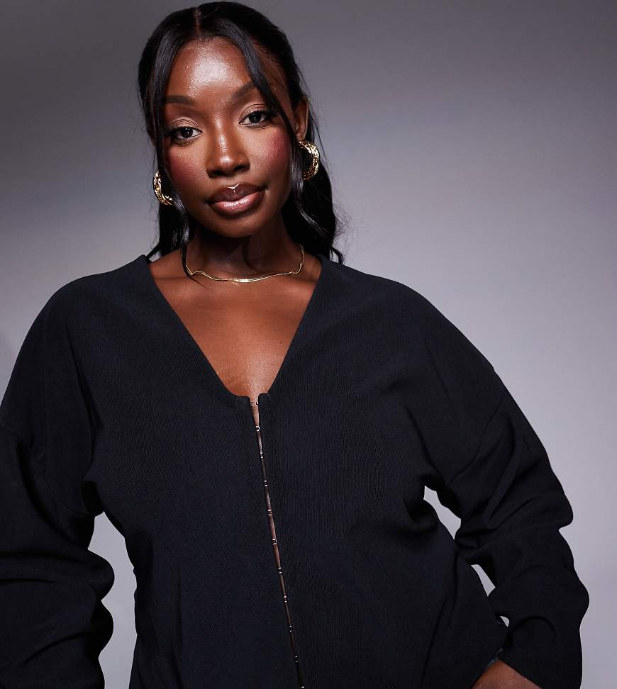 ASOS DESIGN Curve - Geripptes, strukturiertes Oberteil in Schwarz mit Ballonärmeln von ASOS Curve