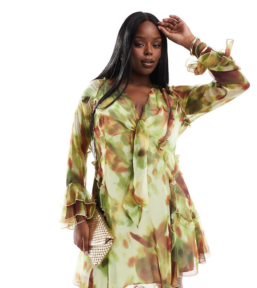 ASOS DESIGN Curve - Gerüschtes Minikleid mit Bindedetail vorne, tiefem Ausschnitt, Rüschenärmeln und abstraktem Muster in Grün-Bunt ASOS DESIGN Curve - Gerüschtes Minikleid mit Bindedetail vorne, tiefem Ausschnitt, Rüschenärmeln und abstraktem Muster in Grün-Bunt von ASOS Curve