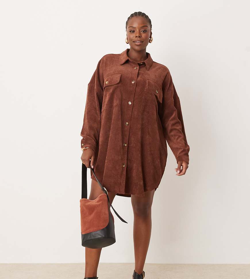 ASOS DESIGN Curve - Hemdblusenkleid aus Cord in Schokoladenbraun mit tief angesetzten Taschen und Oversize-Schnitt ASOS DESIGN Curve - Hemdblusenkleid aus Cord in Schokoladenbraun mit tief angesetzten Taschen und Oversize-Schnitt von ASOS Curve
