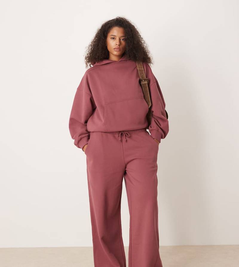 ASOS DESIGN Curve - Hochwertige, schwere Jogginghose in Dunkelrosa mit Ziernähten und weitem Bein, 500 g/m²-Lila ASOS DESIGN Curve - Hochwertige, schwere Jogginghose in Dunkelrosa mit Ziernähten und weitem Bein, 500 g/m²-Lila von ASOS Curve