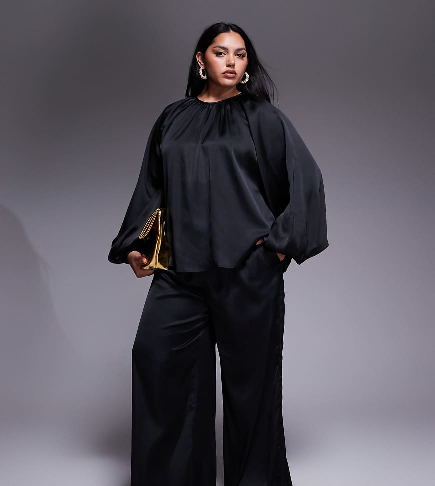 ASOS DESIGN Curve - Hose aus Satin in Schwarz mit weitem Bein, Kombiteil ASOS DESIGN Curve - Hose aus Satin in Schwarz mit weitem Bein, Kombiteil von ASOS Curve