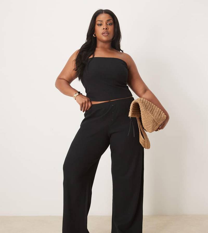 ASOS DESIGN Curve - Hose in Schwarz mit Waffelstruktur und weitem Bein von ASOS Curve