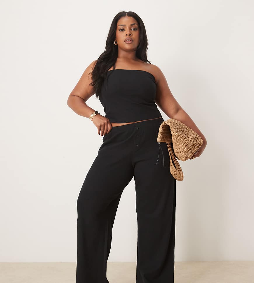 ASOS DESIGN Curve - Hose in Schwarz mit Waffelstruktur und weitem Bein von ASOS Curve