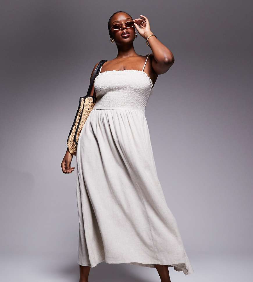 ASOS DESIGN Curve - Isabel - Gesmoktes, trägerloses Strandkleid aus Leinenmix in Natur-Neutral von ASOS Curve