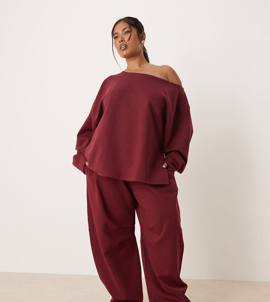 ASOS DESIGN Curve - Jogginghose aus Interlock in Burgunderrot mit weitem, abgerundetem Bein ASOS DESIGN Curve - Jogginghose aus Interlock in Burgunderrot mit weitem, abgerundetem Bein von ASOS Curve