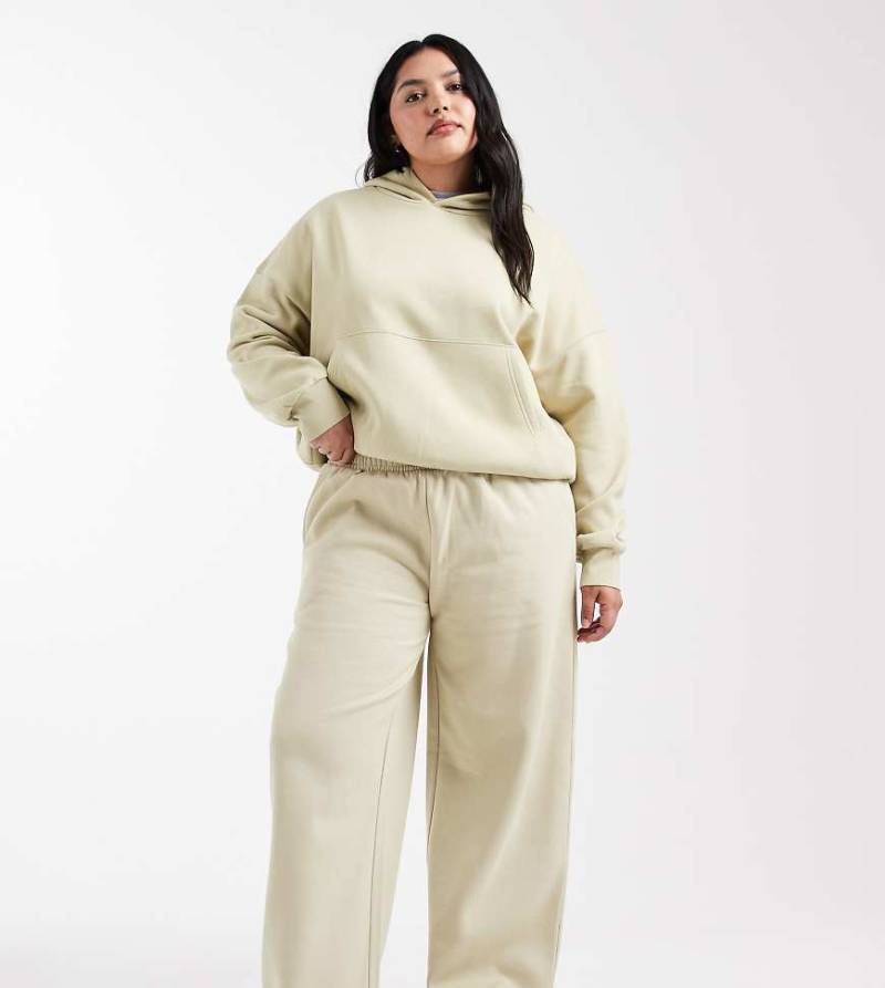 ASOS DESIGN Curve - Jogginghose mit in Olivgrün mit weicher Innenseite und weitem Bein von ASOS Curve