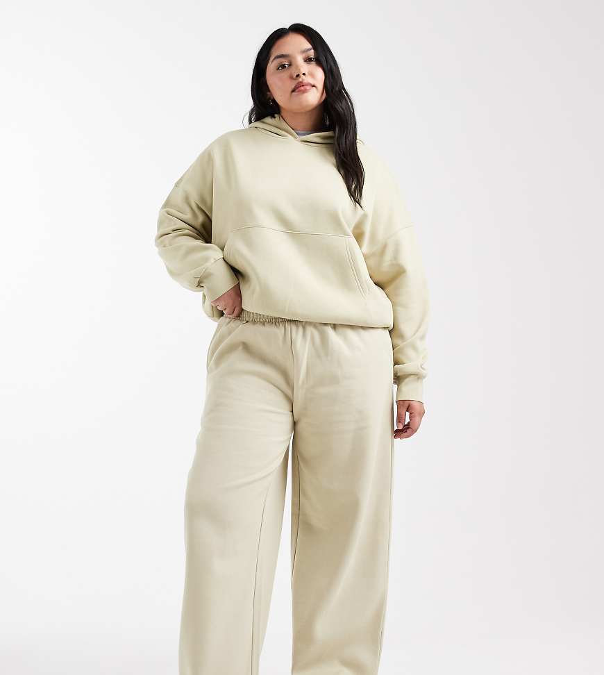 ASOS DESIGN Curve - Jogginghose mit in Olivgrün mit weicher Innenseite und weitem Bein von ASOS Curve