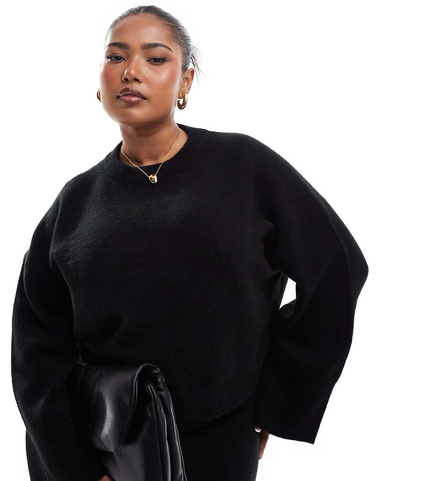 ASOS DESIGN Curve - Kastig geschnittener Pullover in Schwarz mit Rundhalsausschnitt und breiten Bündchen von ASOS Curve