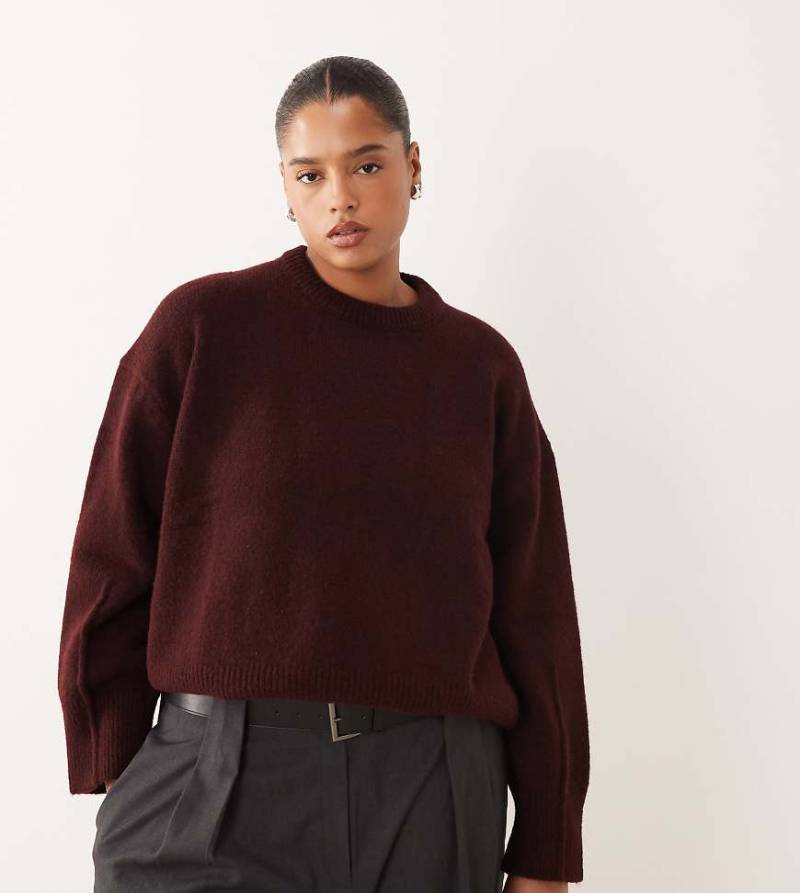 ASOS DESIGN Curve - Kastiger Pullover in Pflaume mit Rundhalsausschnitt und Seitenschlitz-Lila von ASOS Curve