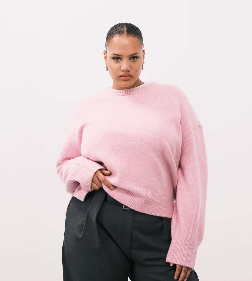 ASOS DESIGN Curve - Kastiger Pullover in Rosa mit Rundhalsausschnitt und Seitenschlitz von ASOS Curve