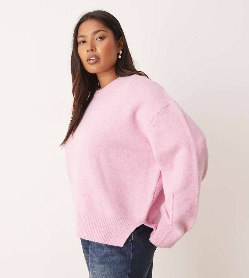 ASOS DESIGN Curve - Kastiger Pullover in Rosa mit Rundhalsausschnitt und Seitenschlitz von ASOS Curve
