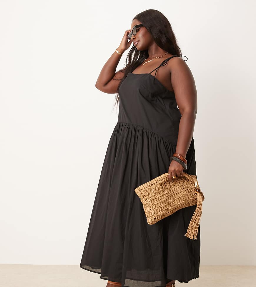 ASOS DESIGN Curve - Maxikleid in Schwarz mit tief angesetzter Taille ASOS DESIGN Curve - Maxikleid in Schwarz mit tief angesetzter Taille von ASOS Curve