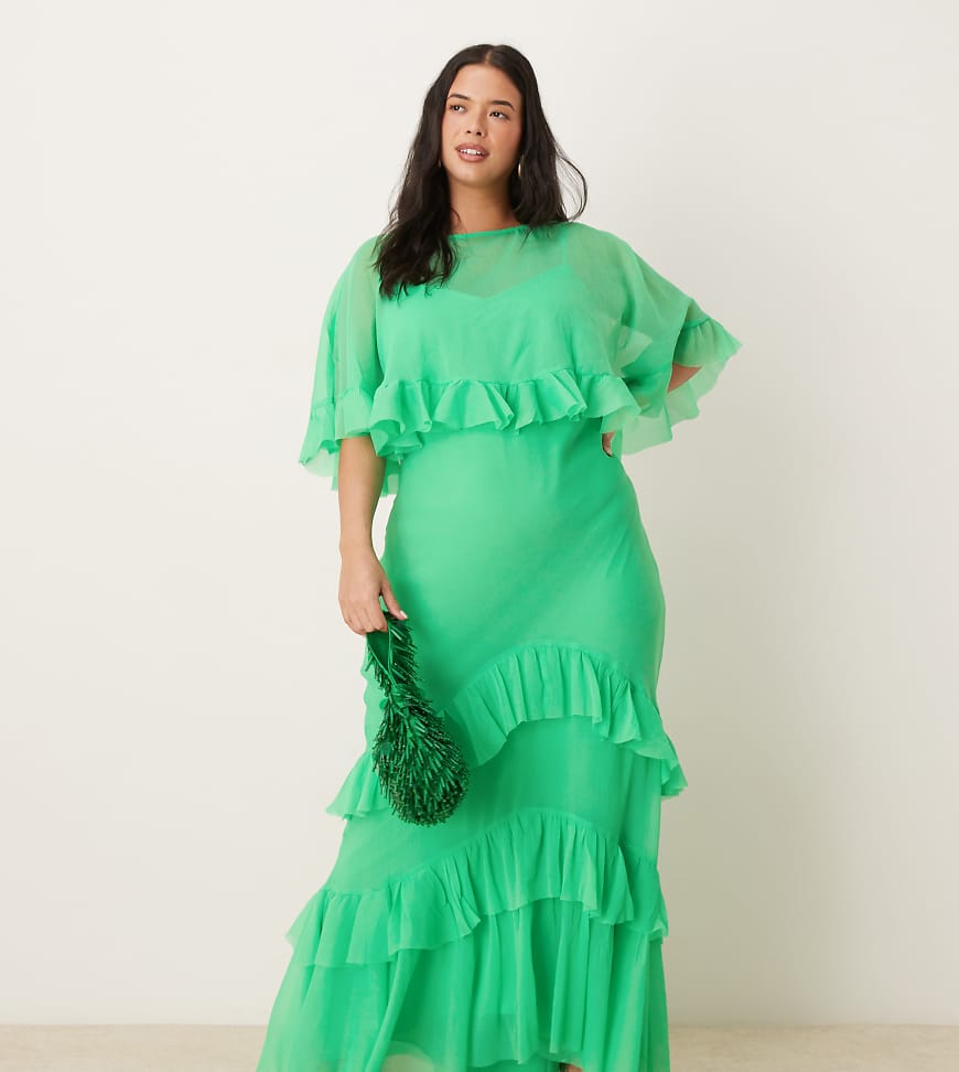 ASOS DESIGN Curve - Maxikleid in leuchtendem Grün mit Cape-Overlay, Rüschen und Schrägschnitt von ASOS Curve