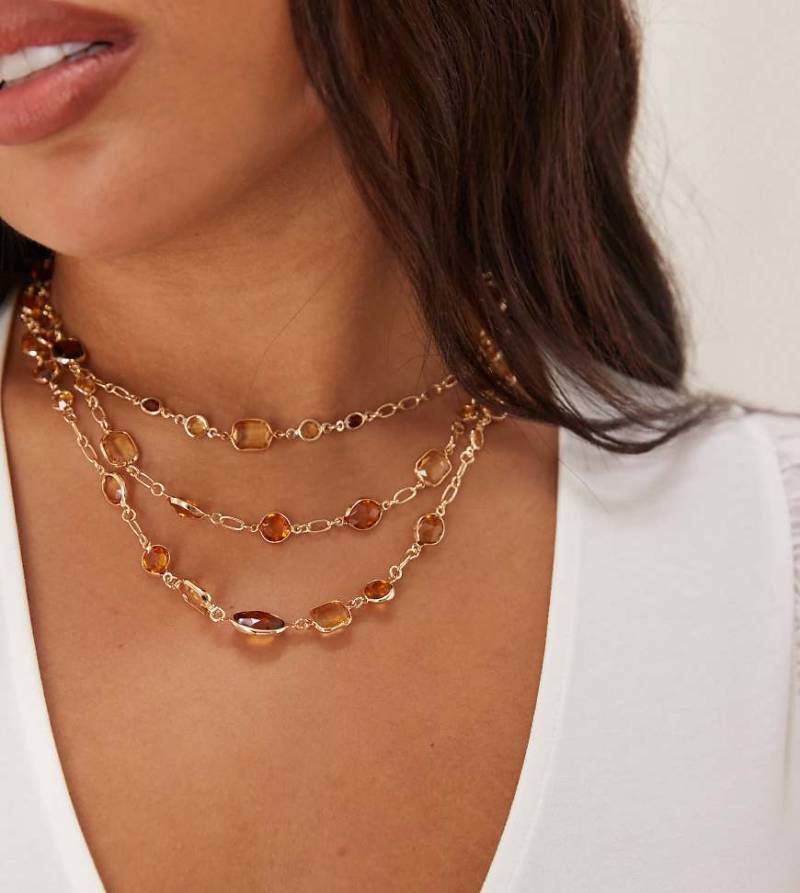 ASOS DESIGN Curve - Mehrreihige, goldfarbene Halskette mit Schmucksteinen in Bernstein-Optik von ASOS Curve