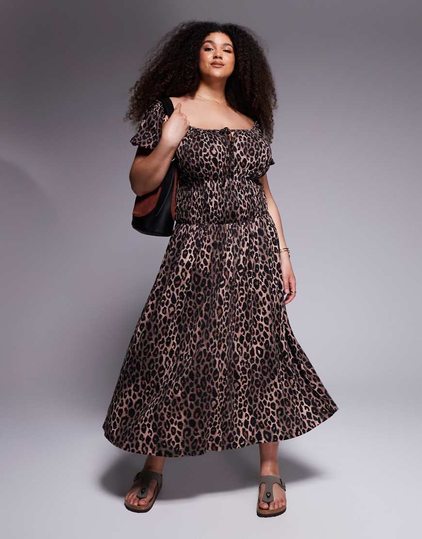 ASOS DESIGN Curve - Midi-Freizeitkleid mit Knittertextur, gesmokter Taille, Milkmaid-Ausschnitt, Puffärmeln und Leopardenmuster-Bunt ASOS DESIGN Curve - Midi-Freizeitkleid mit Knittertextur, gesmokter Taille, Milkmaid-Ausschnitt, Puffärmeln und Leopardenmuster-Bunt von ASOS Curve