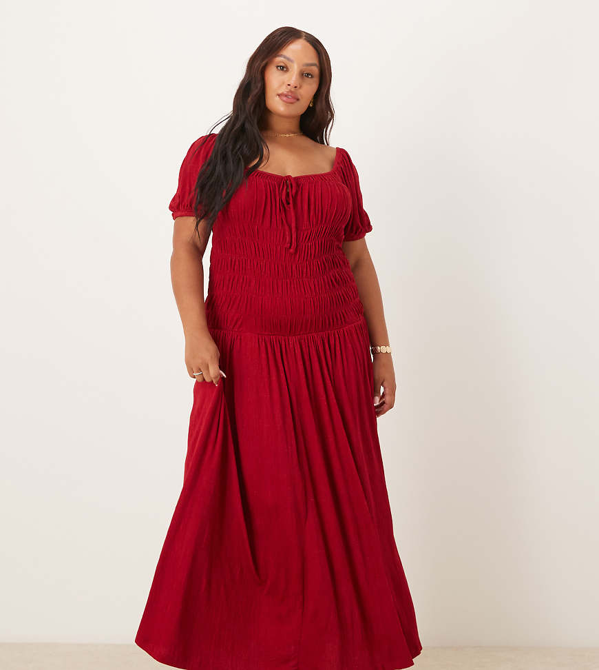 ASOS DESIGN Curve - Midi-Freizeitkleid in Burgunderrot mit Knittertextur, gesmokter Taille, Milchmädchen-Ausschnitt und Puffärmeln-Bunt von ASOS Curve