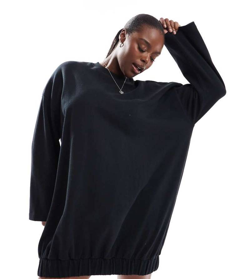 ASOS DESIGN Curve - Minikleid aus Sweatshirt-Stoff in Schwarz mit Cocoon-Ärmeln von ASOS Curve