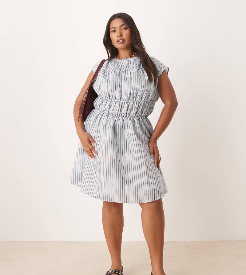 ASOS DESIGN Curve - Minikleid in blau kariert mit gerafftem Oberteil und doppeltem Rock-Rosa von ASOS Curve