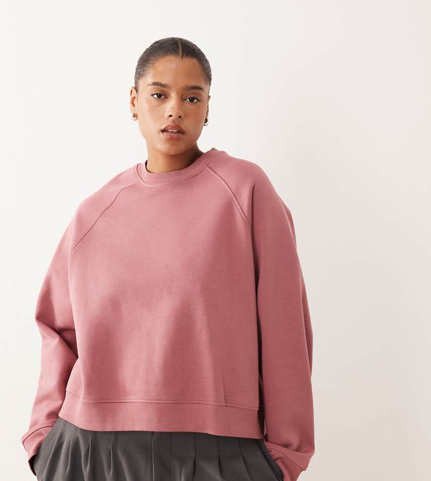 ASOS DESIGN Curve - Oversize-Sweatshirt in Rosé mit Raglan-Detail und weicher Innenseite-Rosa von ASOS Curve