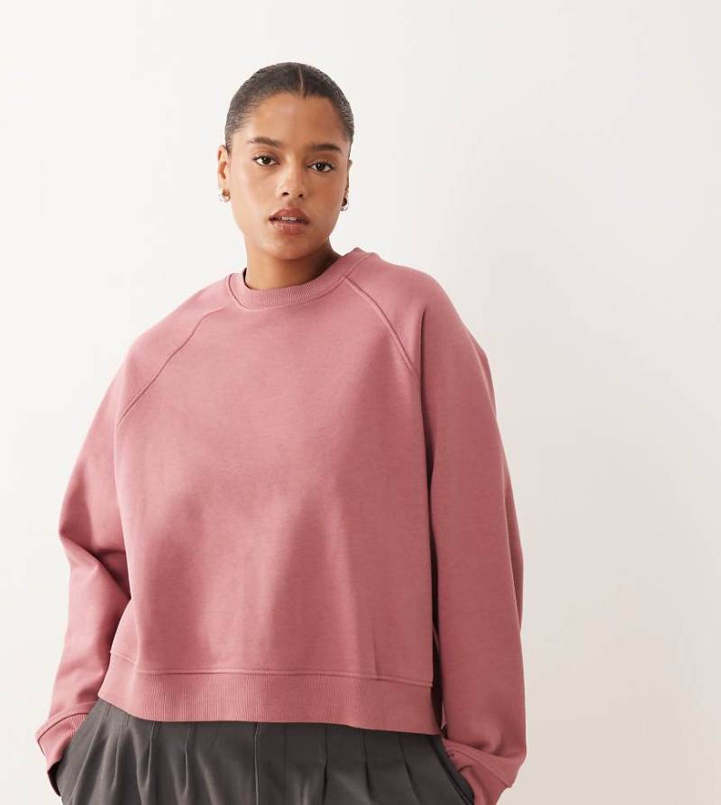 ASOS DESIGN Curve - Oversize-Sweatshirt in Rosé mit Raglan-Detail und weicher Innenseite-Rosa von ASOS Curve