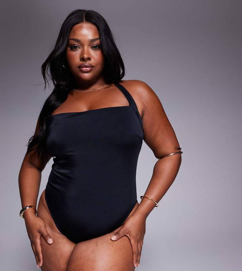 ASOS DESIGN Curve - Revenge - Badeanzug in Schwarz mit gebundenem Neckholder von ASOS Curve