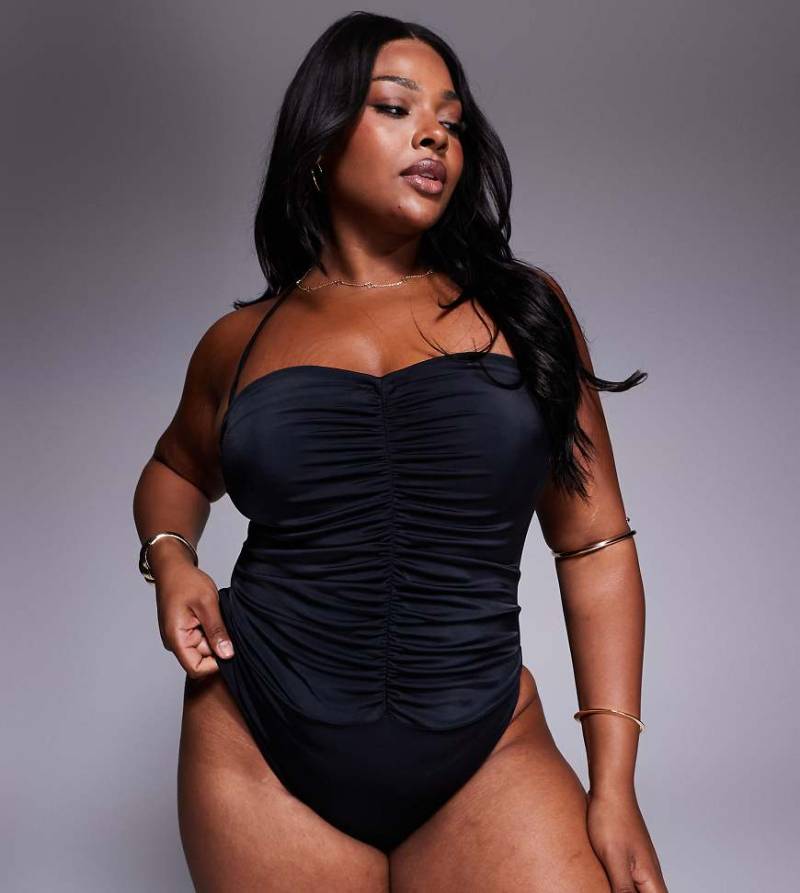 ASOS DESIGN Curve - Revenge - Neckholder-Badeanzug in Schwarz mit Raffung von ASOS Curve
