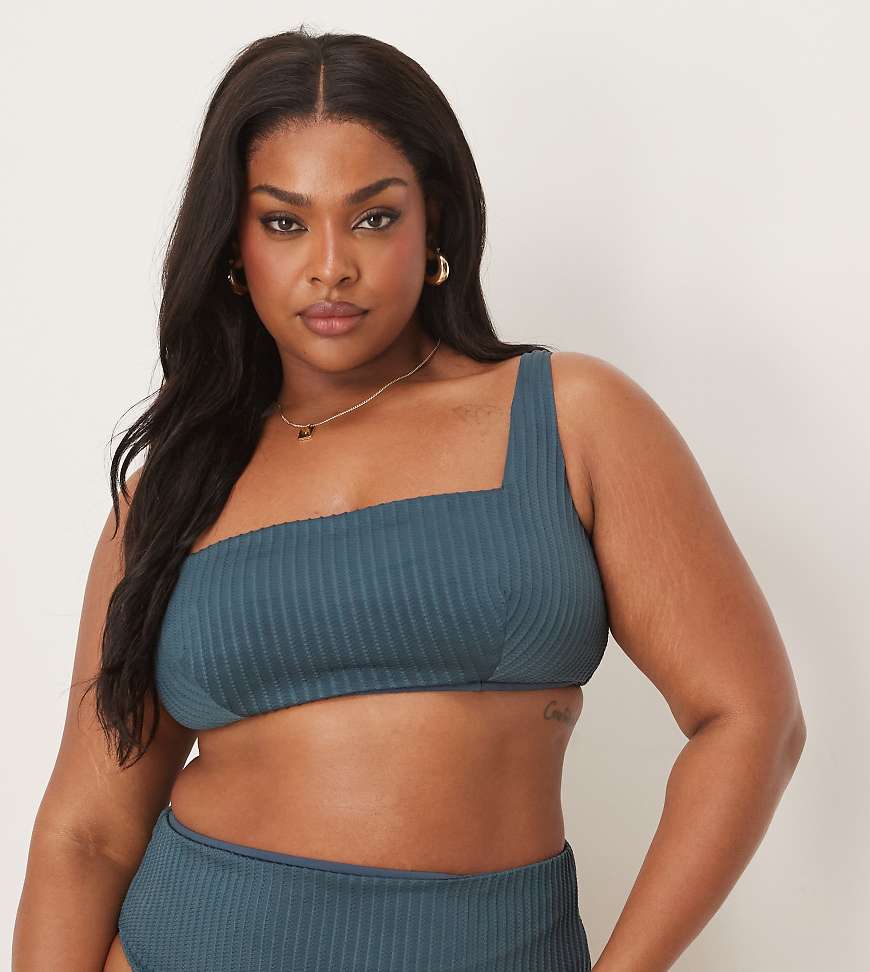 ASOS DESIGN Curve - Riddy - Geripptes kurzes Bikinioberteil in Schieferblau-Grau ASOS DESIGN Curve - Riddy - Geripptes kurzes Bikinioberteil in Schieferblau-Grau von ASOS Curve