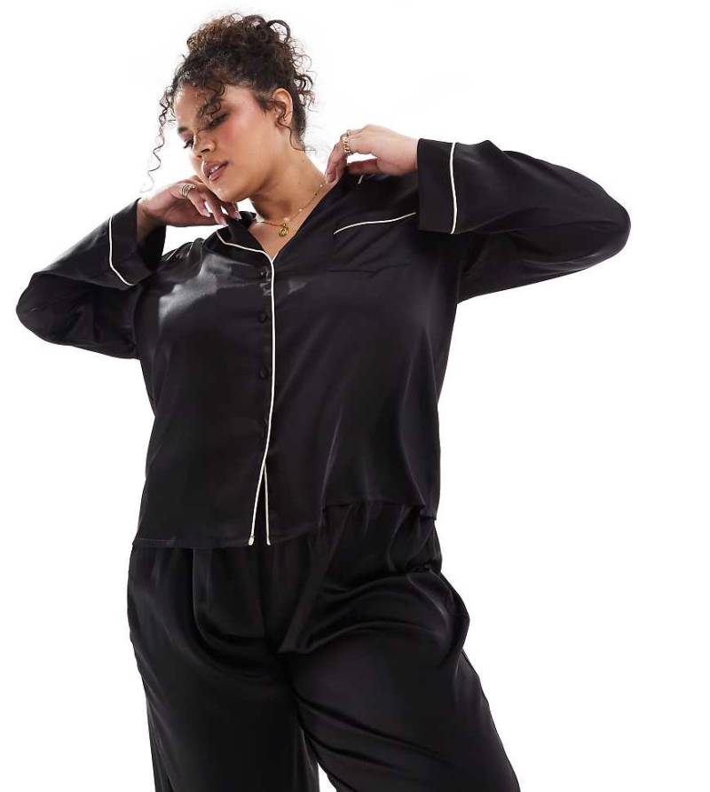 ASOS DESIGN Curve - Satin-Pyjama mit langärmligem Hemd und Hose in Schwarz von ASOS Curve