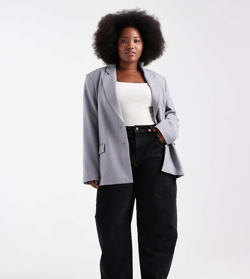 ASOS DESIGN Curve - Schmale Jeans in verwaschenem Schwarz mit abgerundetem Beinschnitt von ASOS Curve