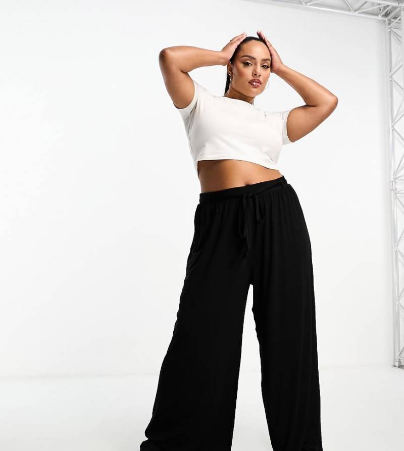 ASOS DESIGN Curve - Schwarze Hose mit weitem Bein und Bindegürtel von ASOS Curve