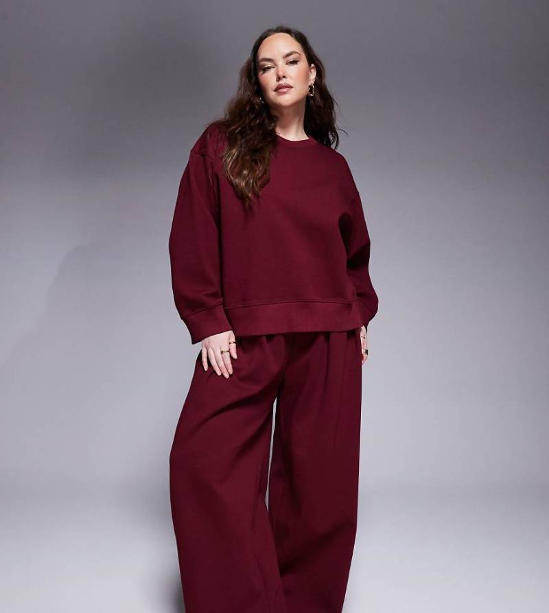 ASOS DESIGN Curve - Sehr weit geschnittene Hose aus Interlock-Stoff in Burgunderrot, Kombiteil von ASOS Curve