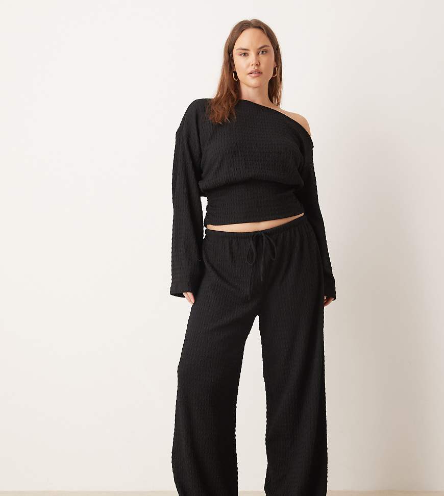 ASOS DESIGN Curve - Strukturierte Hose in Schwarz mit weitem Bein und Bindedetail an der Taille, Kombiteil von ASOS Curve