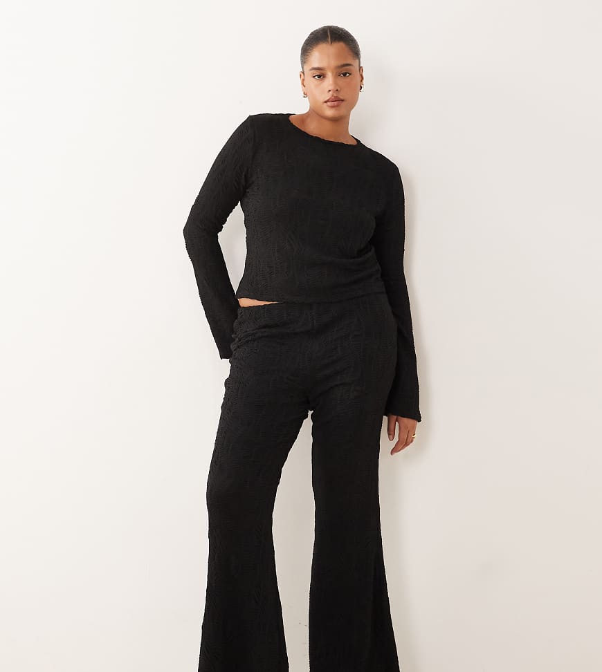 ASOS DESIGN Curve - Strukturierte Schlaghose in Schwarz mit hohem Bund, Kombiteil von ASOS Curve