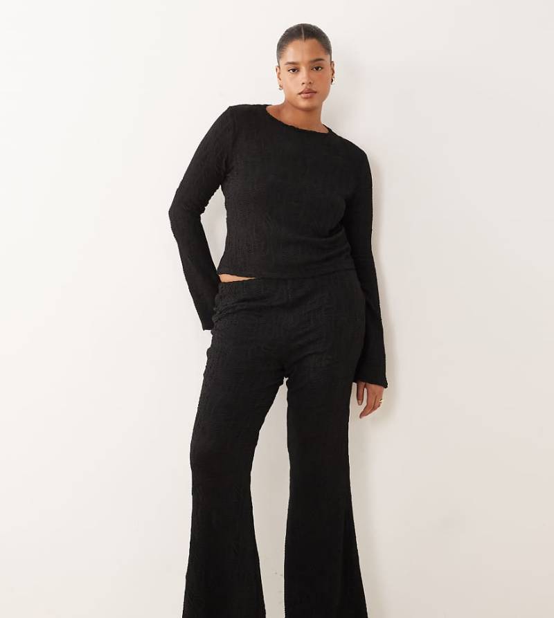 ASOS DESIGN Curve - Strukturierte Schlaghose in Schwarz mit hohem Bund, Kombiteil von ASOS Curve
