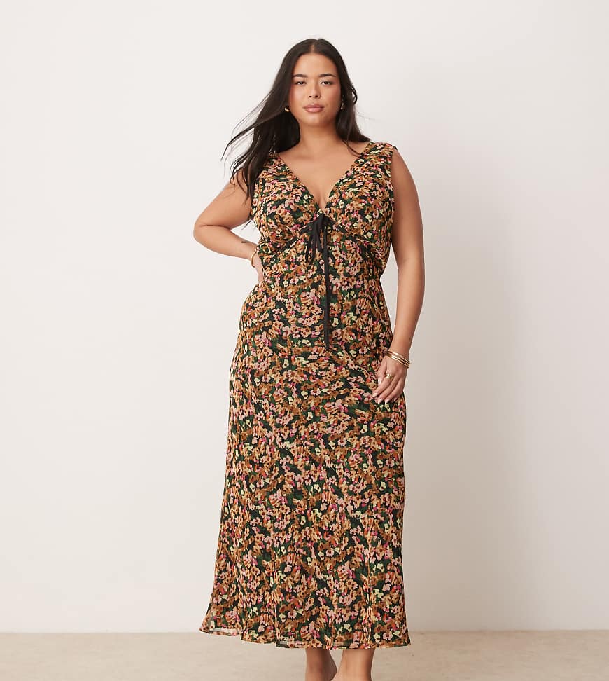 ASOS DESIGN Curve - Trägerkleid mit Blumenmuster, V-Ausschnitt und Bindedetail unter der Brust-Bunt von ASOS Curve