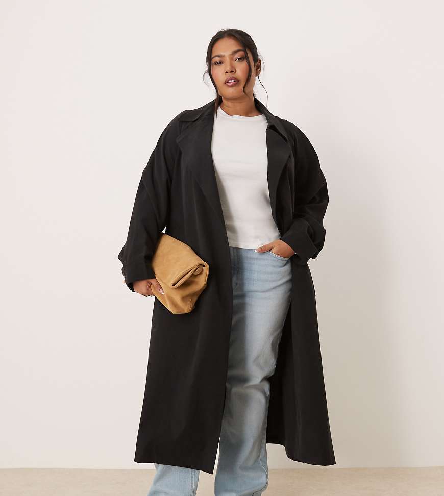ASOS DESIGN Curve - Trenchcoat in Schwarz mit Wasserfallkragen ASOS DESIGN Curve - Trenchcoat in Schwarz mit Wasserfallkragen von ASOS Curve