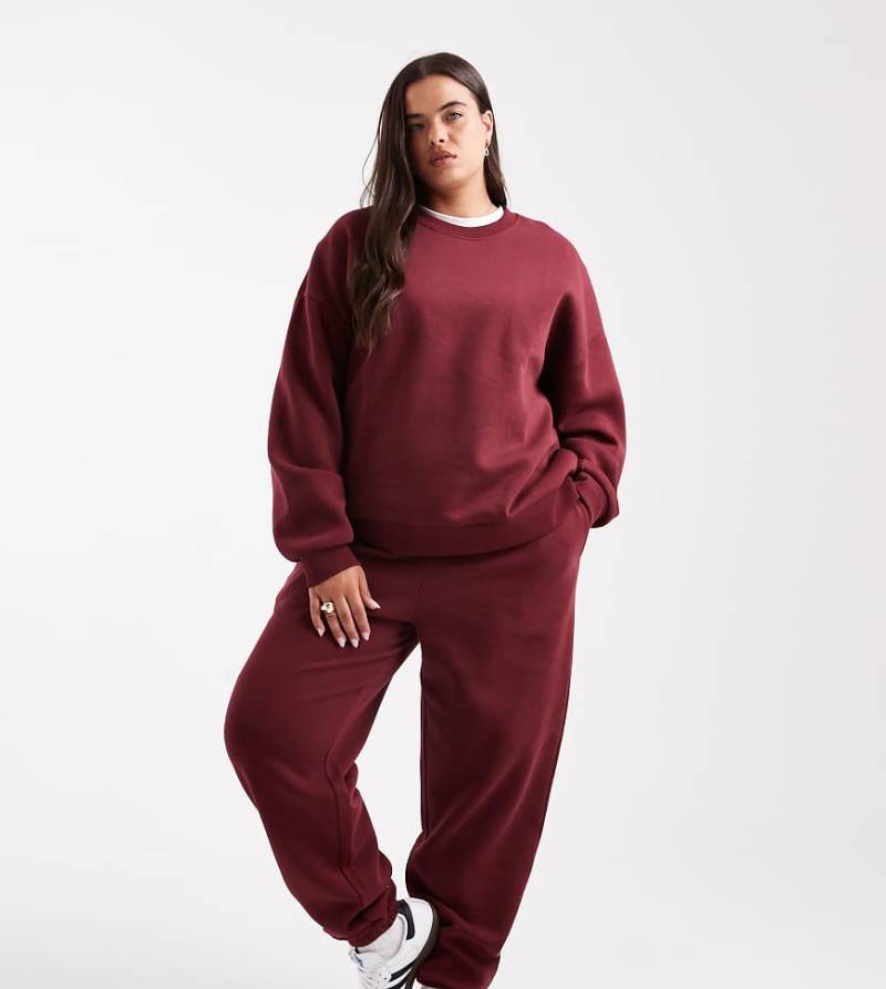 ASOS DESIGN Curve - Ultimate - Jogginghose in Burgunderrot mit weicher Innenseite und Bündchen ASOS DESIGN Curve - Ultimate - Jogginghose in Burgunderrot mit weicher Innenseite und Bündchen von ASOS Curve