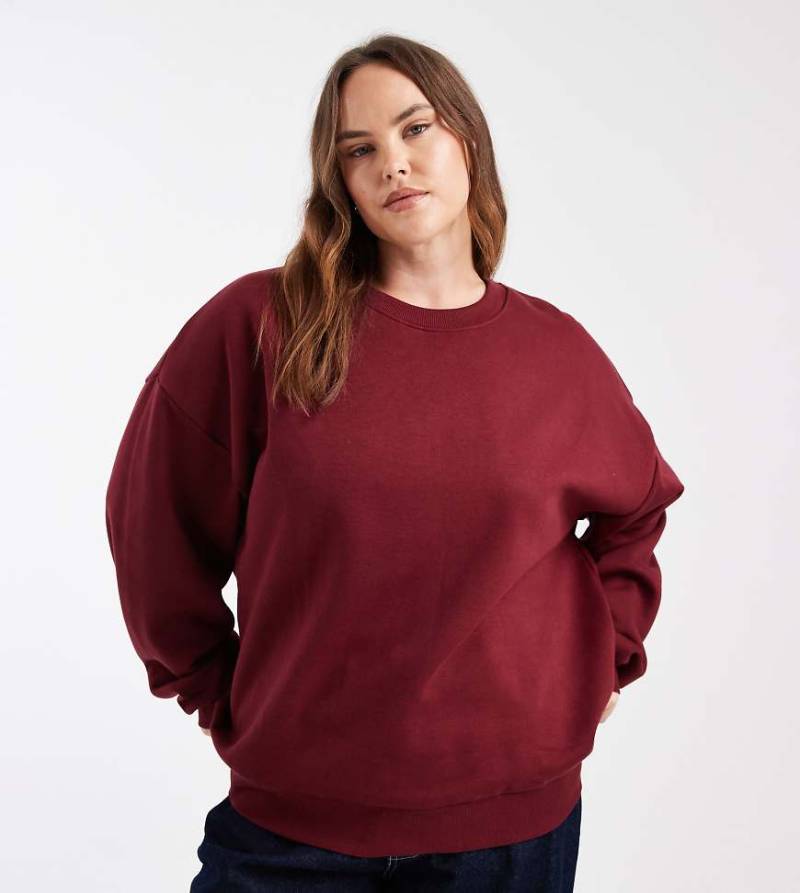 ASOS DESIGN Curve - Ultimate - Oversize-Sweatshirt in Burgunderrot mit angerauter Innenseite von ASOS Curve