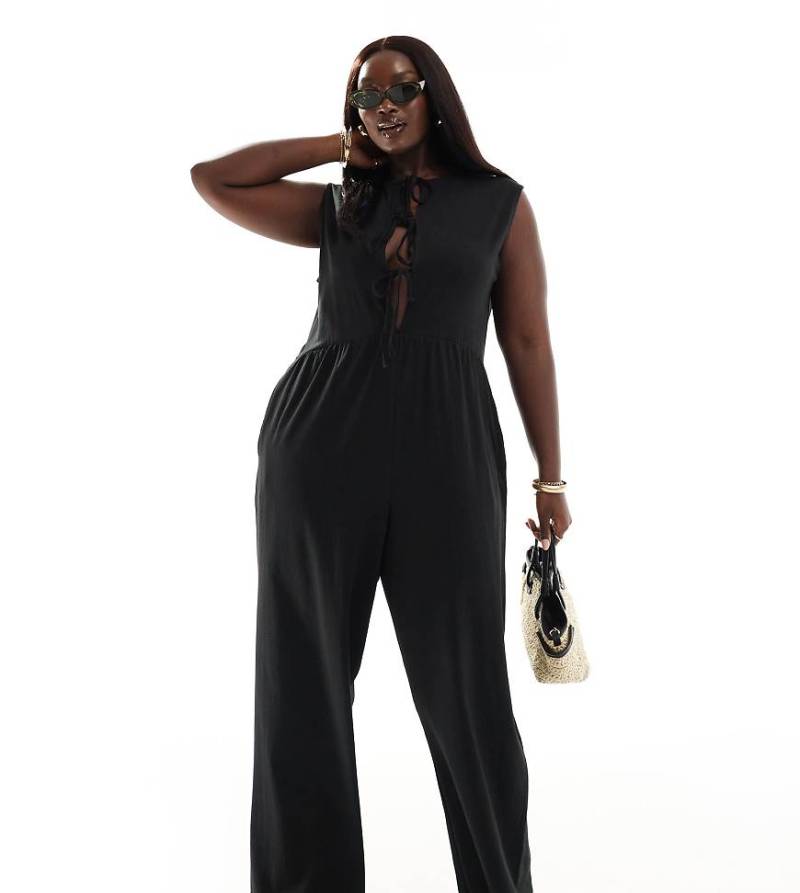ASOS DESIGN Curve - Vorne gebundener Jumpsuit in Schwarz mit weitem Bein von ASOS Curve