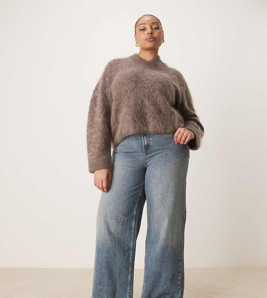 ASOS DESIGN Curve - Weit geschnittene Jeans in Vintage-Waschung mit hohem Bund und Zuglasche-Blau ASOS DESIGN Curve - Weit geschnittene Jeans in Vintage-Waschung mit hohem Bund und Zuglasche-Blau von ASOS Curve