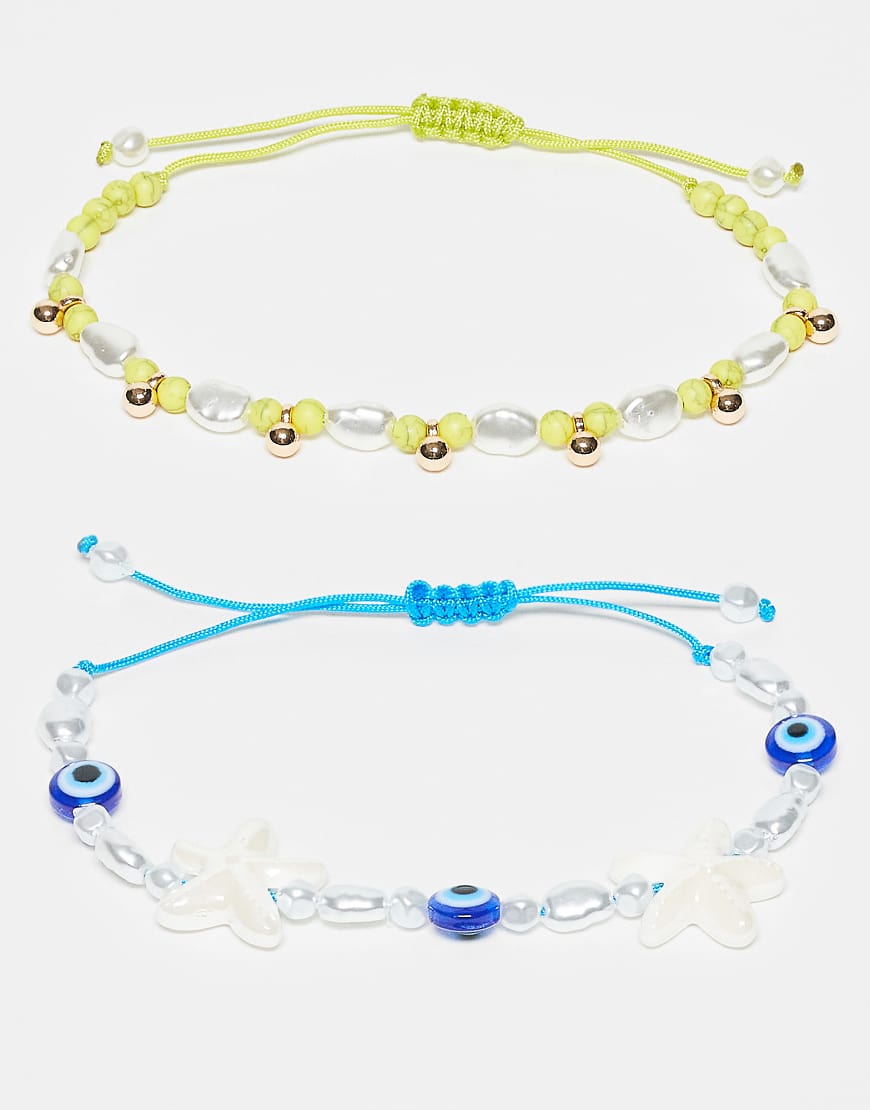 ASOS DESIGN - 2er-Pack Armbänder aus grünen und blauen Zierperlen-Bunt ASOS DESIGN - 2er-Pack Armbänder aus grünen und blauen Zierperlen-Bunt von ASOS DESIGN