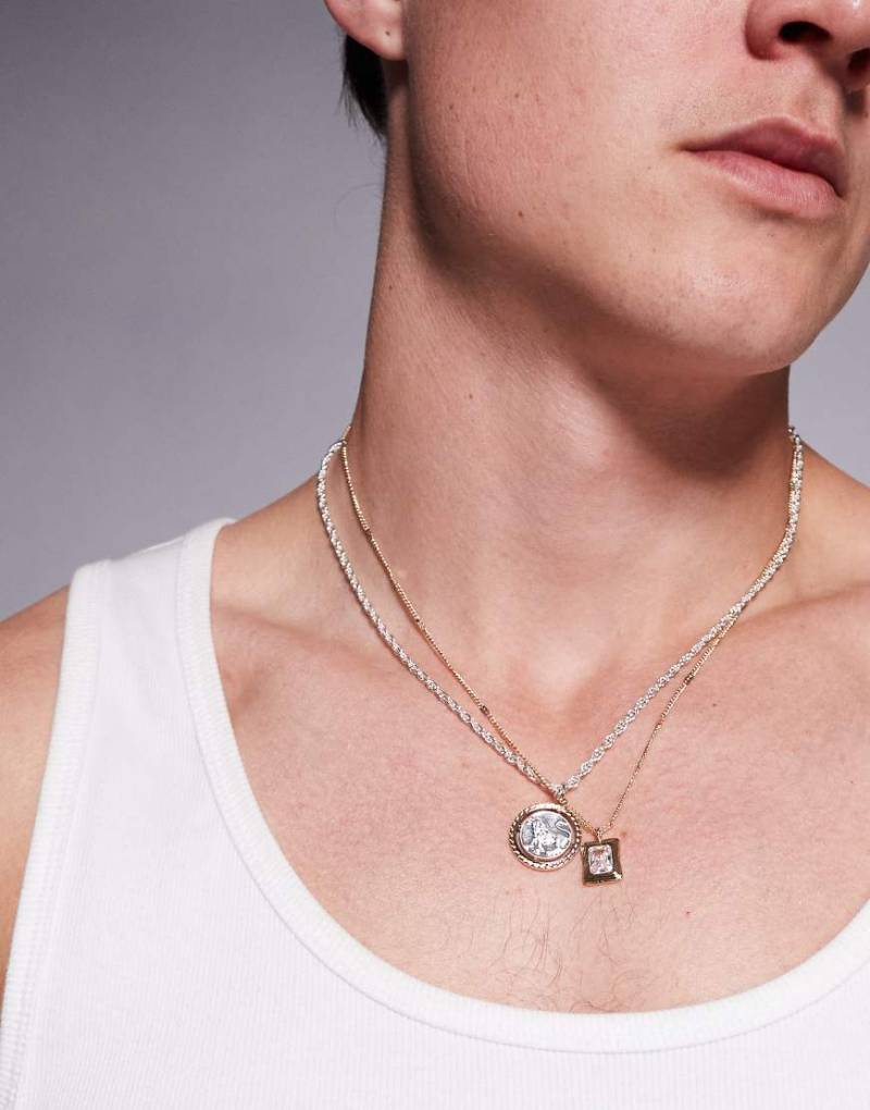ASOS DESIGN - 2er-Pack Halsketten aus verschiedenen Metallen mit Münz- und Kristallanhänger-Silber von ASOS DESIGN