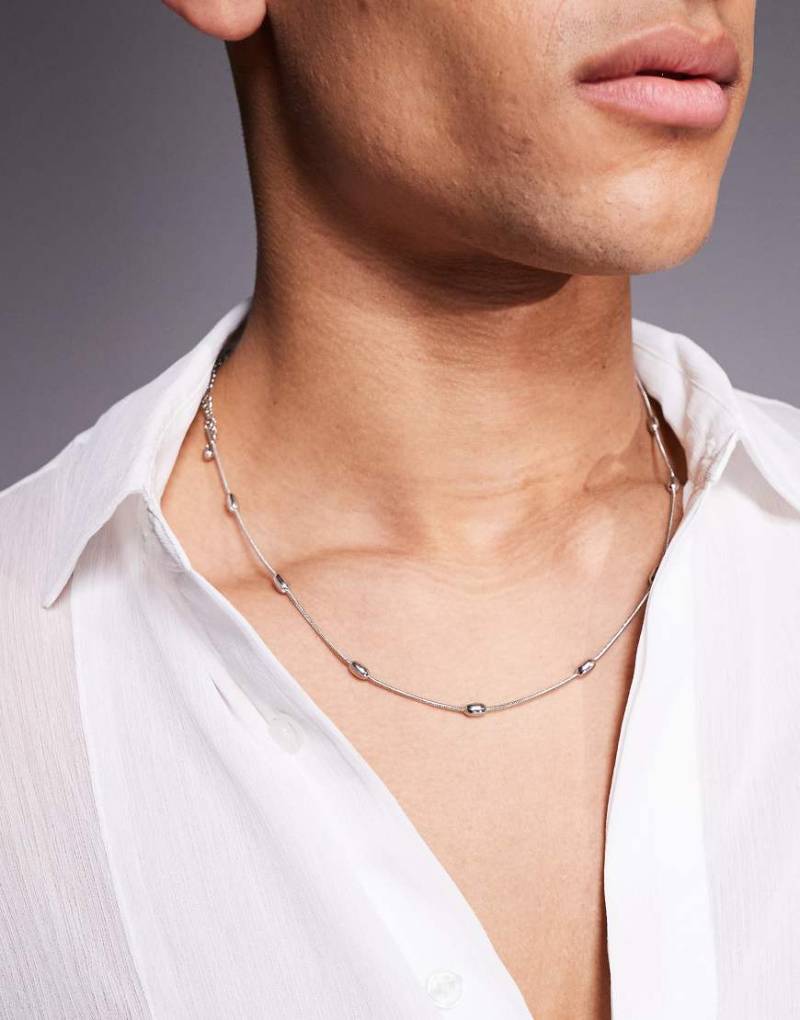 ASOS DESIGN - 2er-Pack Halsketten aus wasserfestem Edelstahl in Silberoptik von ASOS DESIGN
