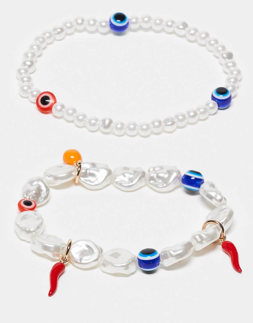 ASOS DESIGN - 2er-Pack Perlen-Armbänder mit Augen- und Kunstperlen-Goldfarben ASOS DESIGN - 2er-Pack Perlen-Armbänder mit Augen- und Kunstperlen-Goldfarben von ASOS DESIGN