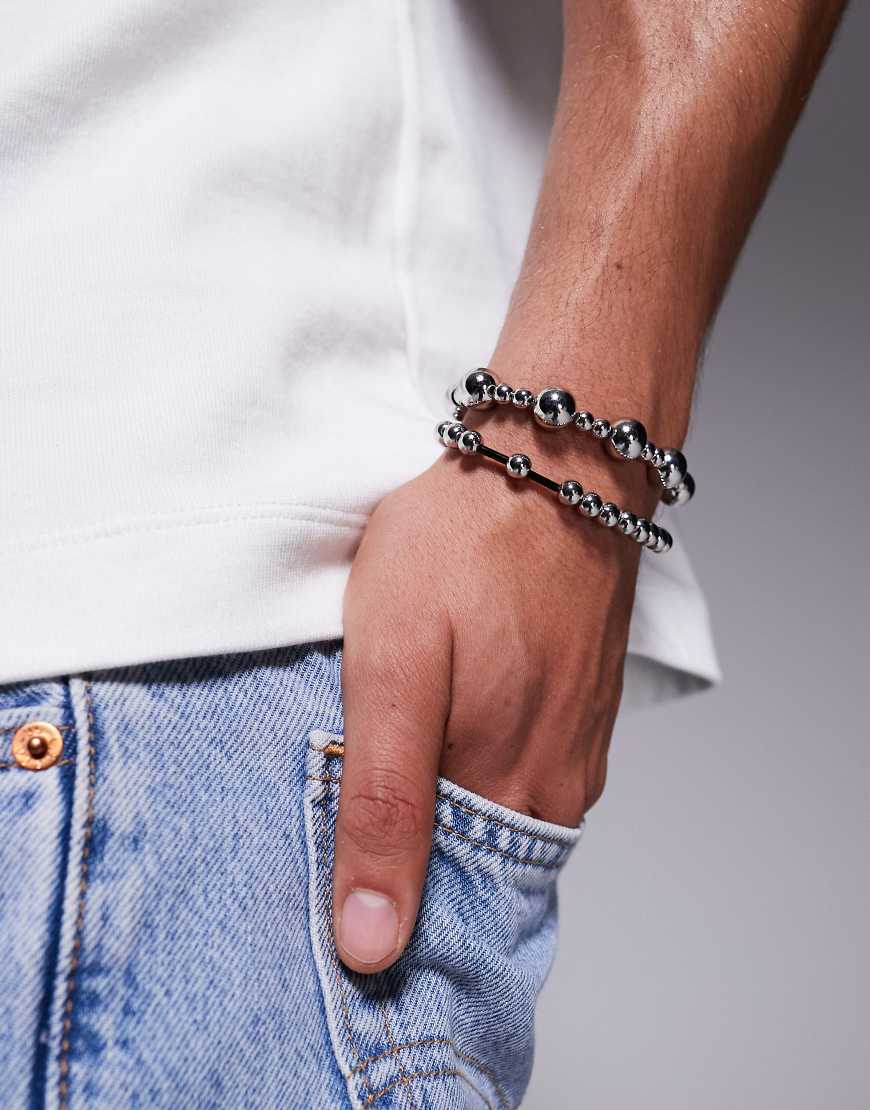 ASOS DESIGN - 2er-Pack Perlenarmbänder mit Elementen in Schwarz und Silberoptik ASOS DESIGN - 2er-Pack Perlenarmbänder mit Elementen in Schwarz und Silberoptik von ASOS DESIGN