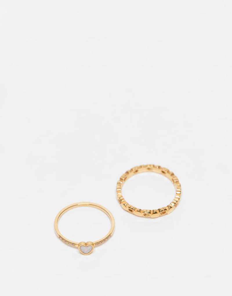 ASOS DESIGN - 2er-Pack Ringe aus Edelstahl mit Herzdesign und Goldoptik-Goldfarben von ASOS DESIGN